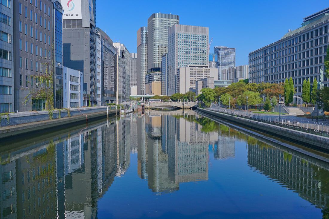 The Nakanoshima river island and Osaka skyline